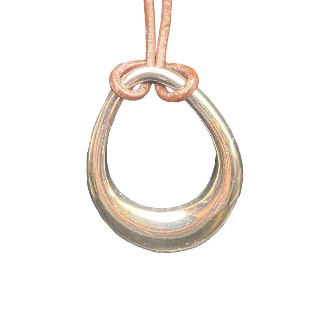 Premier Designs black adjustable cord necklace with silver teardrop pendant!